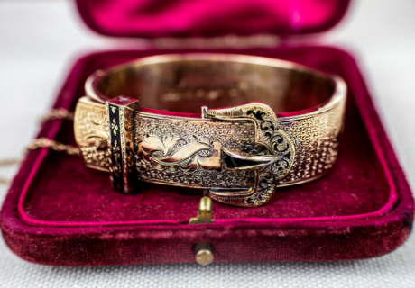 Vintage jewelry buckle bracelet in red box from Arnold Jewelers in Tampa