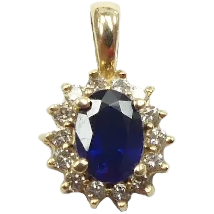 1.44ctw Sapphire Gold Pendant with Diamond Halo
