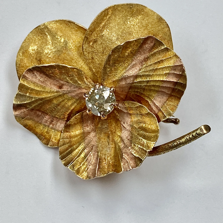 Lot - JEWELRY: Two 14K Gold Pins: a yellow gold Art Nouveau pansy pin,  purple enameled pansy with one old European cut diamond in center,  (approximately 0.03 ct). 7/8 x 5/8, diamond