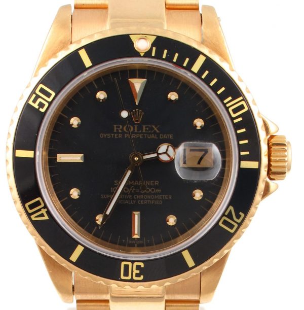 Pre-Owned 1980 Yellow Gold Rolex Submariner 40MM Watch With Black Nipple Dial And Black Bezel With Oyster Band Model# 16808 face view