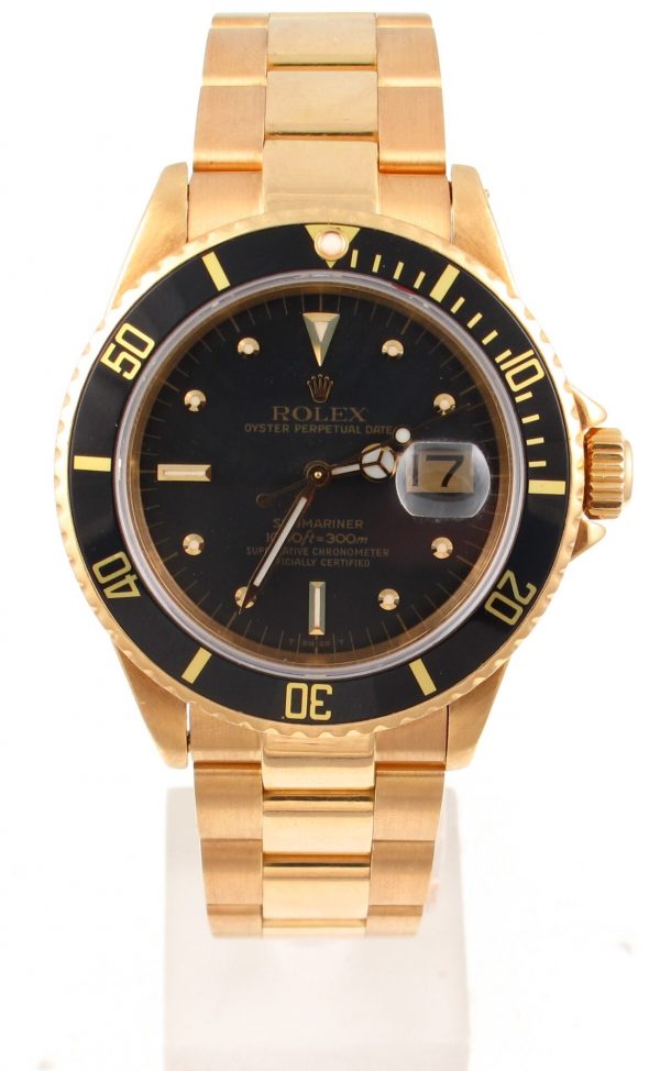 Pre-Owned 1980 Yellow Gold Rolex Submariner 40MM Watch With Black Nipple Dial And Black Bezel With Oyster Band Model# 16808