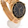 Pre-Owned 1980 Yellow Gold Rolex Submariner 40MM Watch With Black Nipple Dial And Black Bezel With Oyster Band Model# 16808 left view