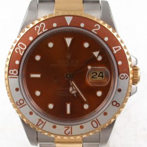 1991 Pre-Owned Rolex GMT Master II 40MM Rootbeer Bezel face