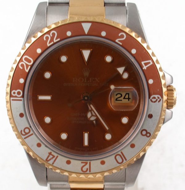 1991 Pre-Owned Rolex GMT Master II 40MM Rootbeer Bezel face