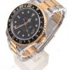 Pre-Owned 2000 Rolex GMT Master II 40MM Watch Two Tone With Black Dial and Black Bezel With Oyster Band Model 16713 right side