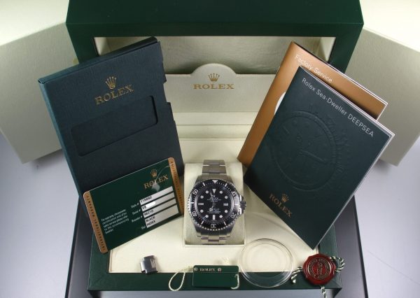 Pre-Owned Rolex DeepSea Sea-Dweller 2010 Stainless Steel Watch With MK1 Black Index Dial And Black Ceramic Bezel With Glide Lock Oyster Band Model# 116660 with box and papers