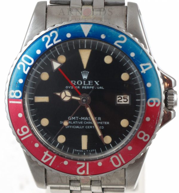 Pre-Owned 1967 Vintage Rolex GMT Master Watch Stainless Steel With MK 1 Long E Black Dial With Creamy Markers Very Nicely Faded Red And Blue (Pepsi)Bezel With Jubilee Band Model 1675