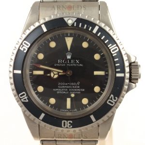 Pre-Owned 1963 Highly Collectable and Rare Vintage Rolex No Date Submariner Watch Stainless Steel "Neat Fonts" Meters First Black Dial and Black Bezel With Oyster Band Model 5512