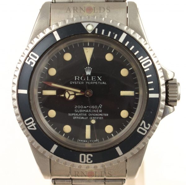 Pre-Owned 1963 Highly Collectable and Rare Vintage Rolex No Date Submariner Watch Stainless Steel "Neat Fonts" Meters First Black Dial and Black Bezel With Oyster Band Model 5512