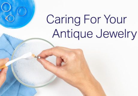 Caring for antique jewelry hand washing vintage jewelry piece in bowl