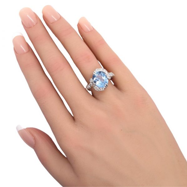 6 Carat Blue Topaz Platinum Ring with Diamonds Worn