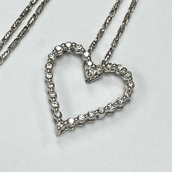 Diamond heart pendant with .52 ctw diamonds on chain