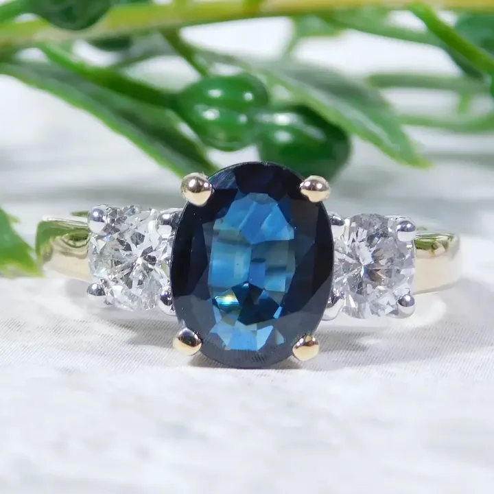 2.63ctw Sapphire & Diamond Alternative Engagement Ring 14K Gold with leaves in background
