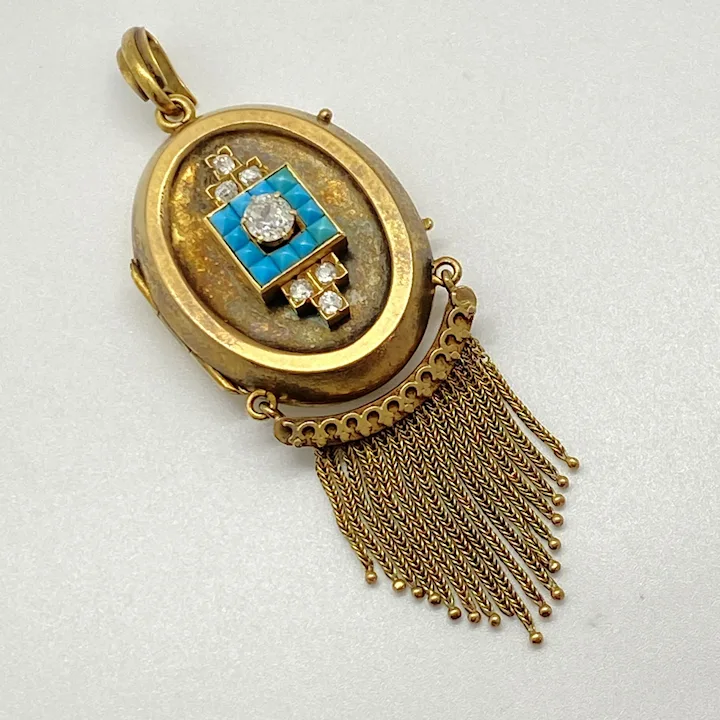 Turquoise and 14K Gold pendant with gold tassles