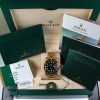 Pre-Owned Rolex Submariner 40MM 2018 18kt Yellow Gold Watch With Black Dial And Black Ceramic Bezel With Oyster Band Model# 116618LN box and paper