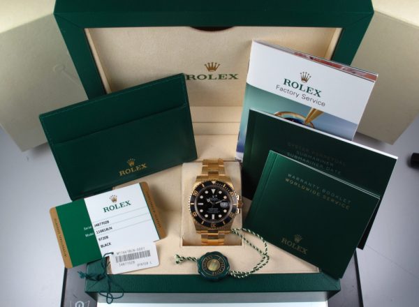 Pre-Owned Rolex Submariner 40MM 2018 18kt Yellow Gold Watch With Black Dial And Black Ceramic Bezel With Oyster Band Model# 116618LN box and paper