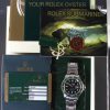 Pre-Owned 2007 Rolex Anniversary Submariner 40MM Watch With Black Maxi Index Dial And Green Bezel (The Kermit) With Oyster Band Model# 16610LV box and papers inside