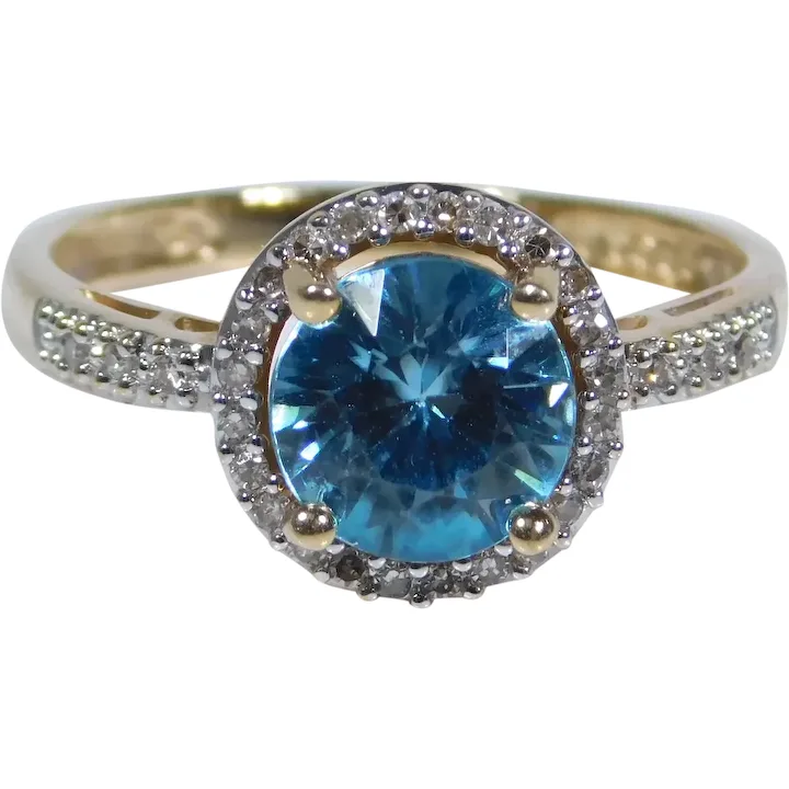 1.73ctw Blue Topaz Halo Two Tone Ring 14K