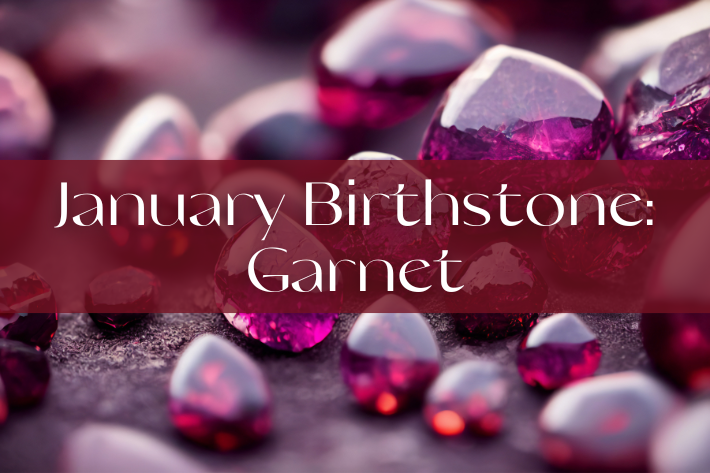 garnets on a table with the text January Birthstone Garnet in middle