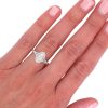 1 carat Marquise Tapered Halo Hand