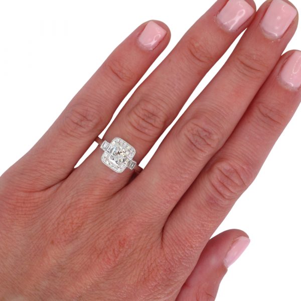 1 carat deco inspired halo engagement ring hand