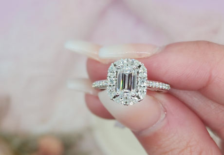 Emerald Cut engagement ring with diamond halo