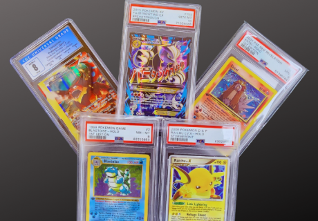 Sell your pokemon Cards for Cash with four graded pokemone cards on black sheet