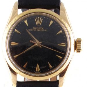 Pre-Owned Rolex Oyster Perpetual (1958) 18kt Yellow Gold 31MM 6547 Front Close