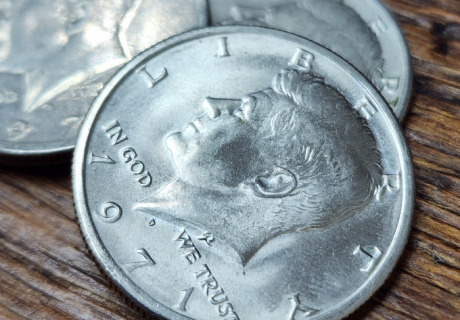 1971 Kennedy Half Dollars in Tampa stacked on one another on wooden background