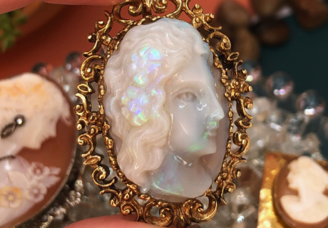 Octobers Birthstone Opal shown in an opal cameo brooch pendant