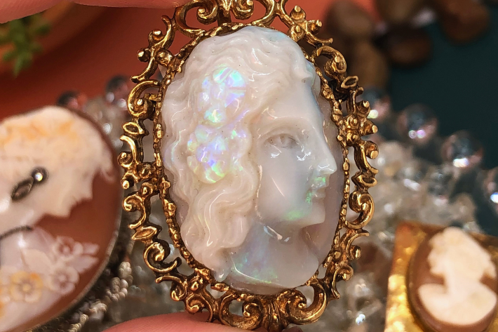 Octobers Birthstone Opal shown in an opal cameo brooch pendant
