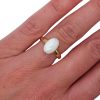 2 carat opal solitaire gold ring worn