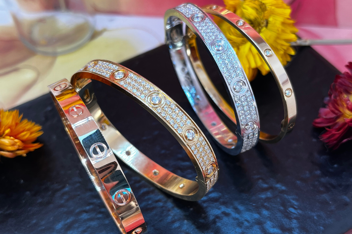 Four bracelets, some yellow gold, other white gold