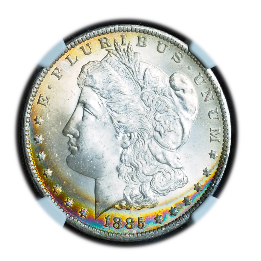 1885-O Morgan Silver Dollar MS65* NGC Crescent Rainbow Toned