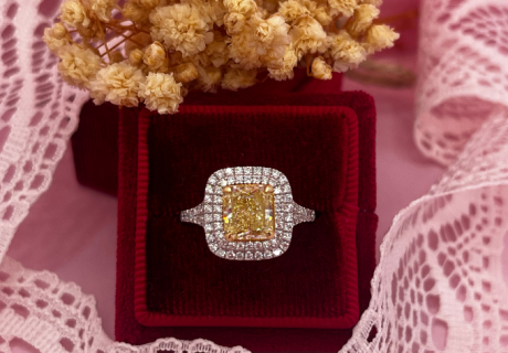 yellow diamond engagement ring with double diamond halo