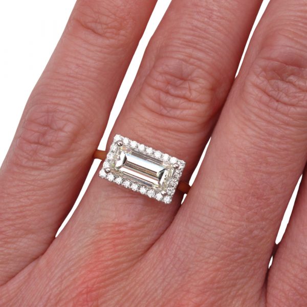 2 carat baguette diamond halo ring hand