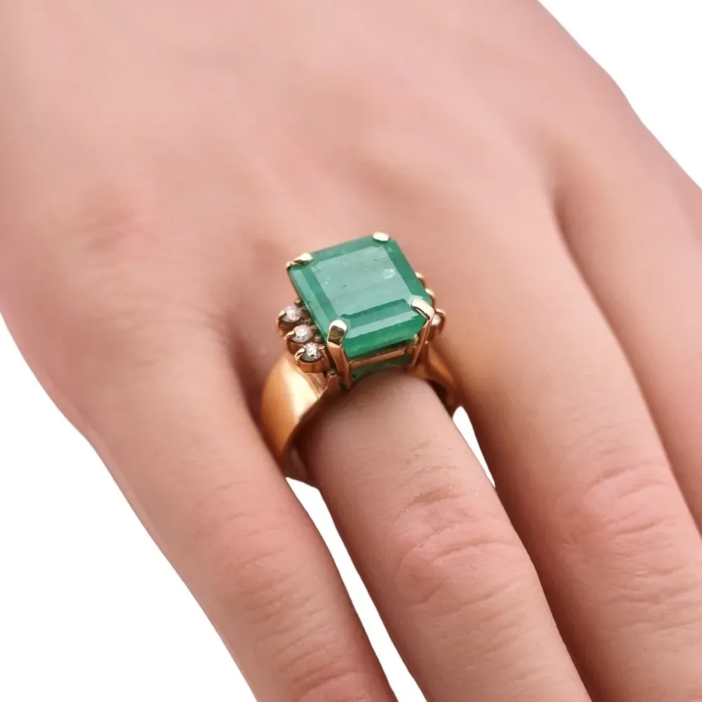 8.65ctw Emerald Ring with Diamond Accents in 14K Gold worn on hand 8.65ctw Emerald Ring with Diamond Accents in 14K Gold worn on hand