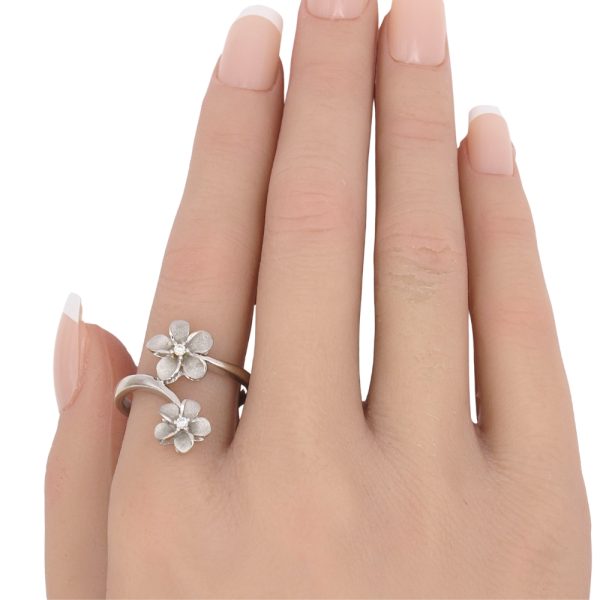 0.06ctw Diamond Plumeria Flower Ring 14K White Gold worn