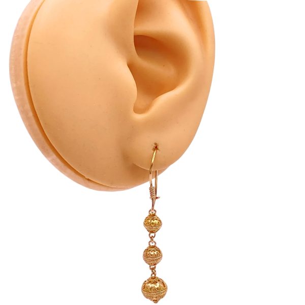 Graduated Bead Dangle Earrings 22K Baht Gold worn