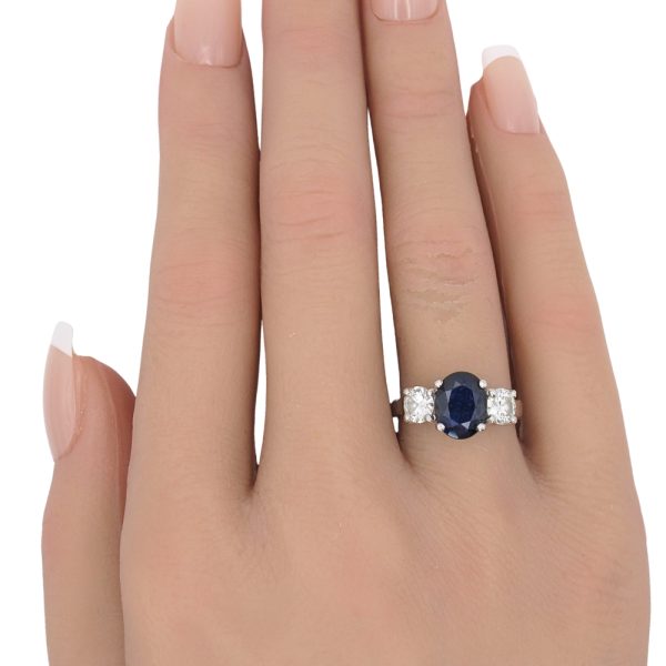 3.24ctw Sapphire Three-Stone Ring Platinum worn