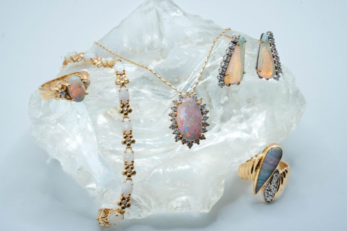 color changing gems Arnold Jewelers - opal jewelry on clear rock