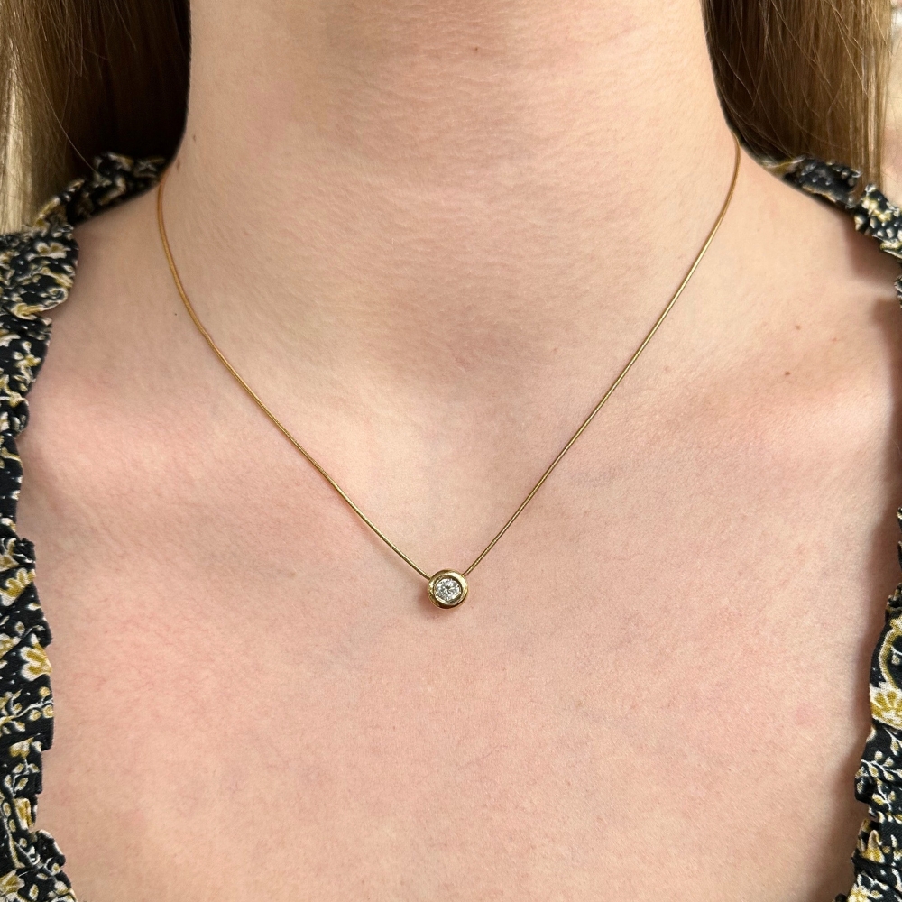 0.50ct Diamond Solitaire Bezel Necklace 14K Gold worn 0.50ct Diamond Solitaire Bezel Necklace 14K Gold worn