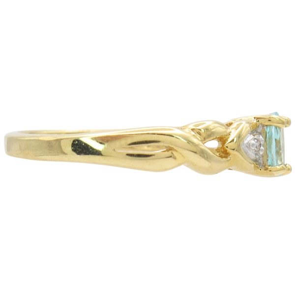 Petite 0.25ctw Aquamarine Ring 18K Two-Tone Gold side