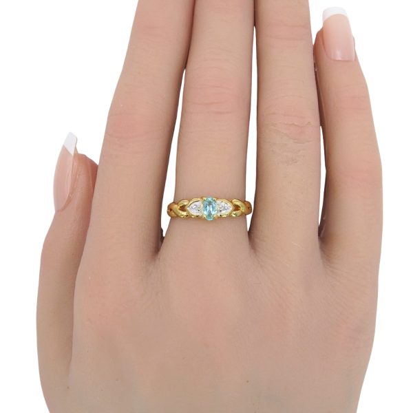 Petite 0.25ctw Aquamarine Ring 18K Two-Tone Gold worn