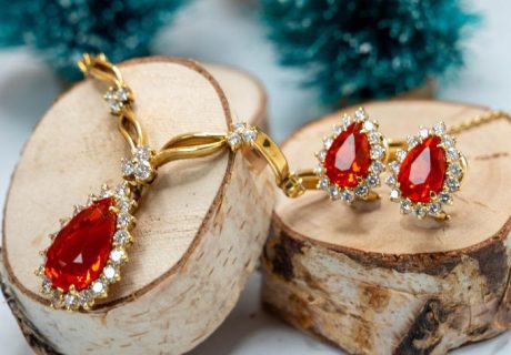 best holiday gifts with gold necklace with fire opal pendant and matching fire opal earrings
