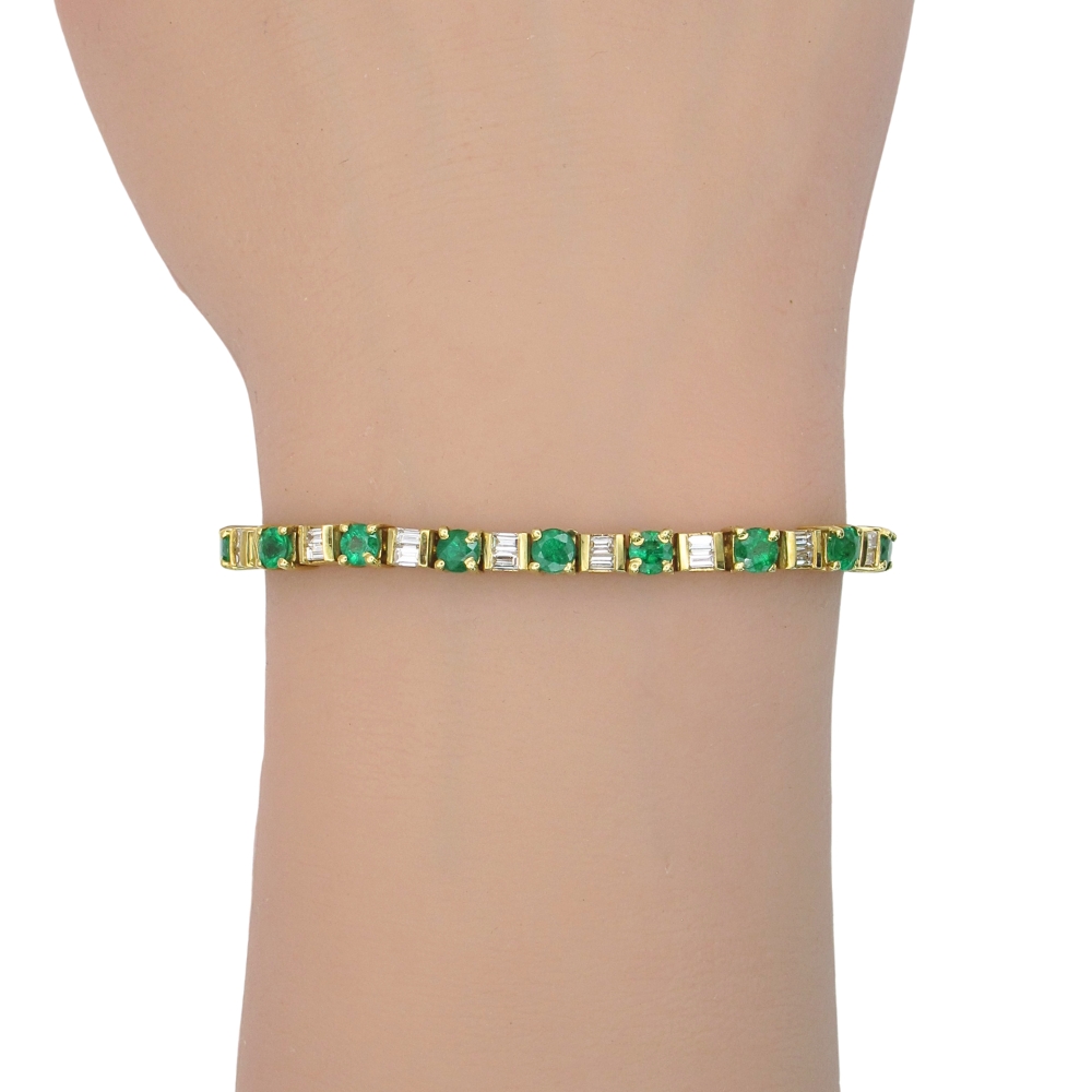 5.75ctw Natural Emerald Line Bracelet 18K Gold worn 5.75ctw Natural Emerald Line Bracelet 18K Gold worn
