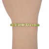 11.50ctw Peridot Line Bracelet 14K Gold worn