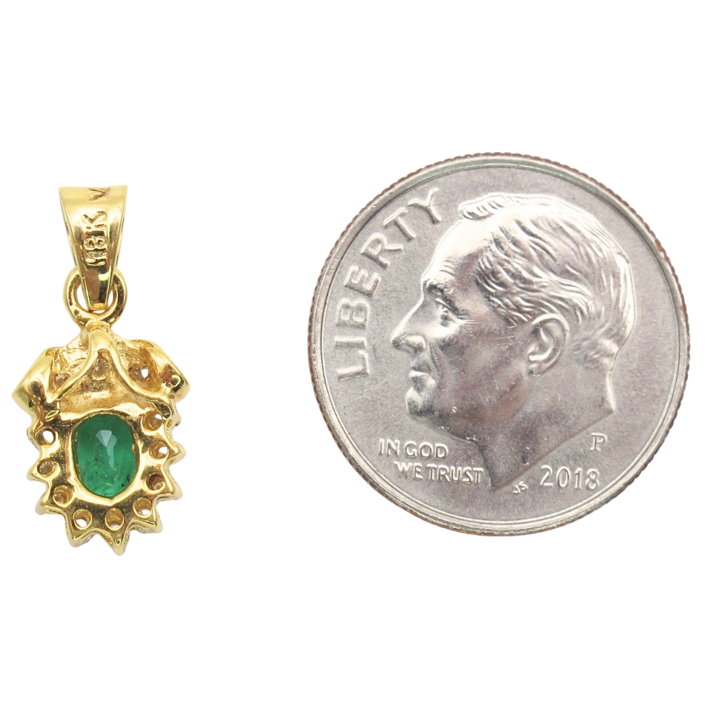 0.61ctw Natural Emerald Pendant with Diamond Accents 18K Gold back and size 0.61ctw Natural Emerald Pendant with Diamond Accents 18K Gold back and size
