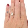 0.71ct H-I1 Pear Diamond Bezel Set Engagement Ring in 14K White & Yellow Gold Modeled