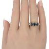 2.34ctw Sapphire Three-Stone Ring with Diamond Accents 18K Gold worn